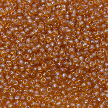 SV100-109: Vintage Venetian Seed Bead Raw Sienna Trans Luster 10/0 - 250 Grams
