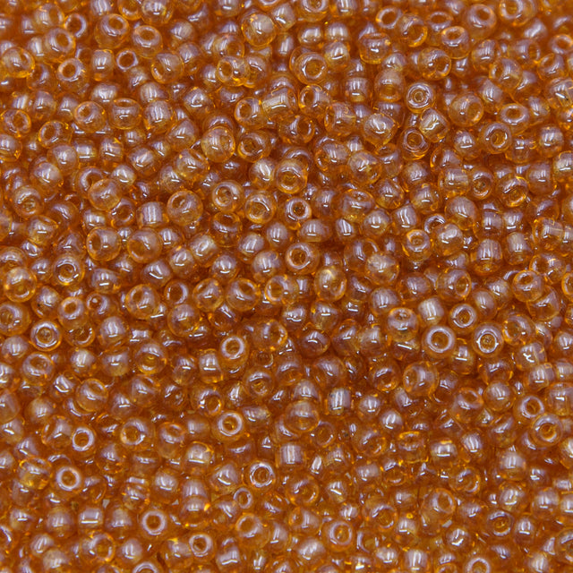SV100-109: Vintage Venetian Seed Bead Raw Sienna Trans Luster 10/0 - 250 Grams