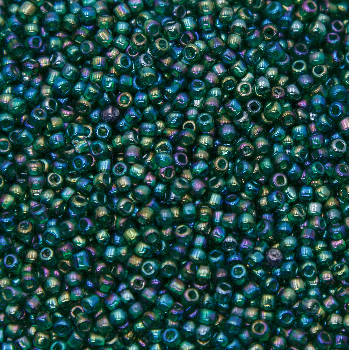 SV100-111: Vintage Venetian Seed Bead Trans Forrest Green Iris AB 10/0 - 250 Grams