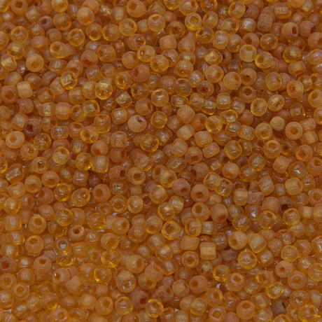 SV100-136: Vintage Venetian Seed Bead Trans Light Topaz 10/0 - 250 Grams