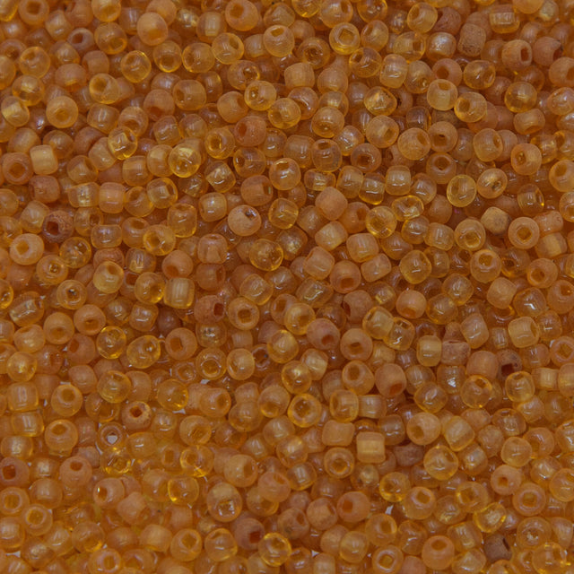 SV100-136: Vintage Venetian Seed Bead Trans Light Topaz 10/0 - 250 Grams