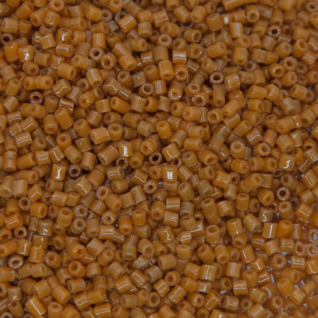 SV100-63: Vintage Venetian Bugle Dark Sienna 2MM AVG - 250 Grams