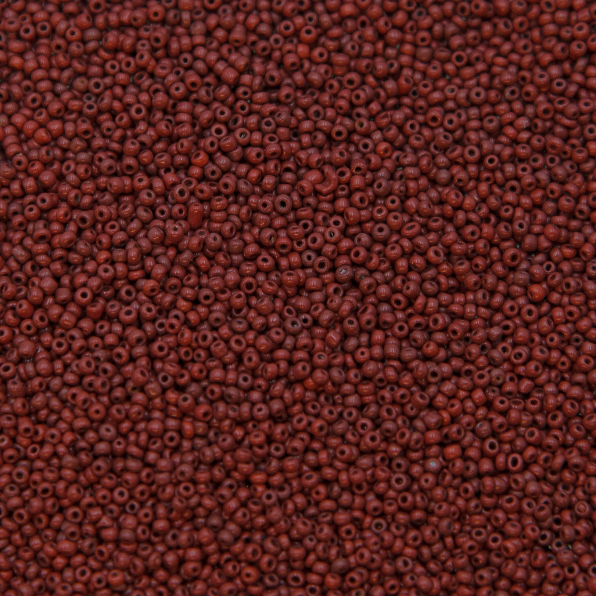 SV100-89: Vintage Venetian Seed Bead Micro Red/Brown 18/0 AVG - 250 Grams