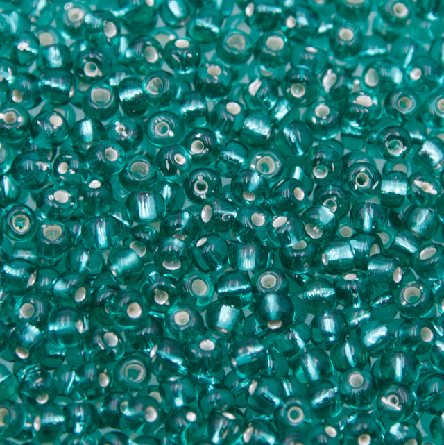 SV100-94: Vintage Venetian Seed Bead Silverlined Emerald 5/0 - 250 Grams